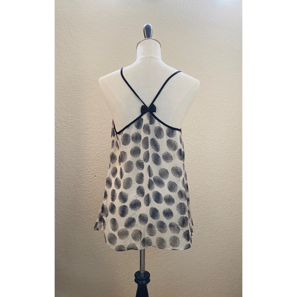 Semi sheer tank with black bow